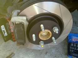 New Rotor, Brake Caliper Mounting Assembly and Brake Pads Fitted