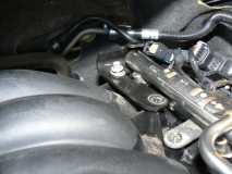 Fuel Rail end bracket bolt removed